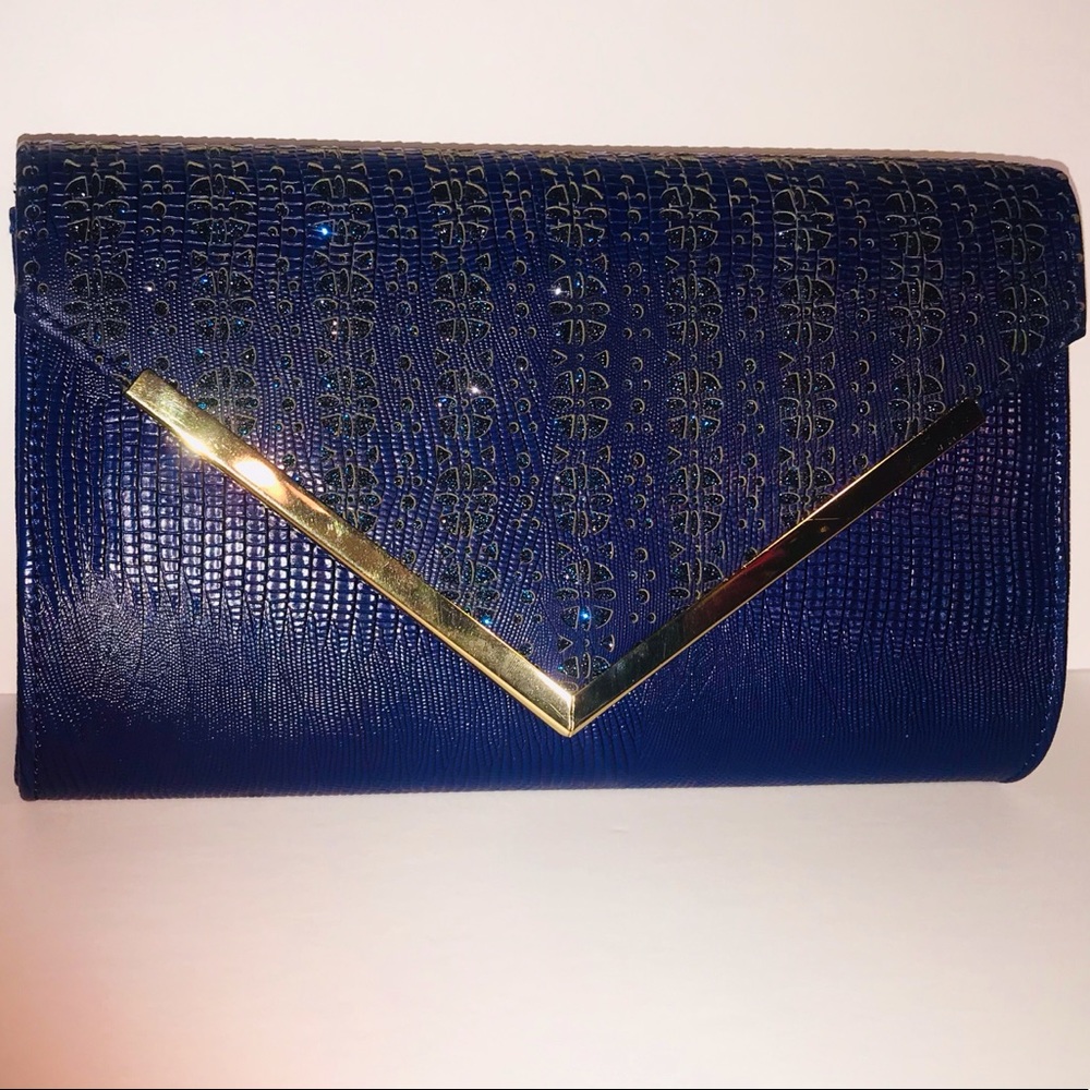 Clutch with gold and sparkle accents.